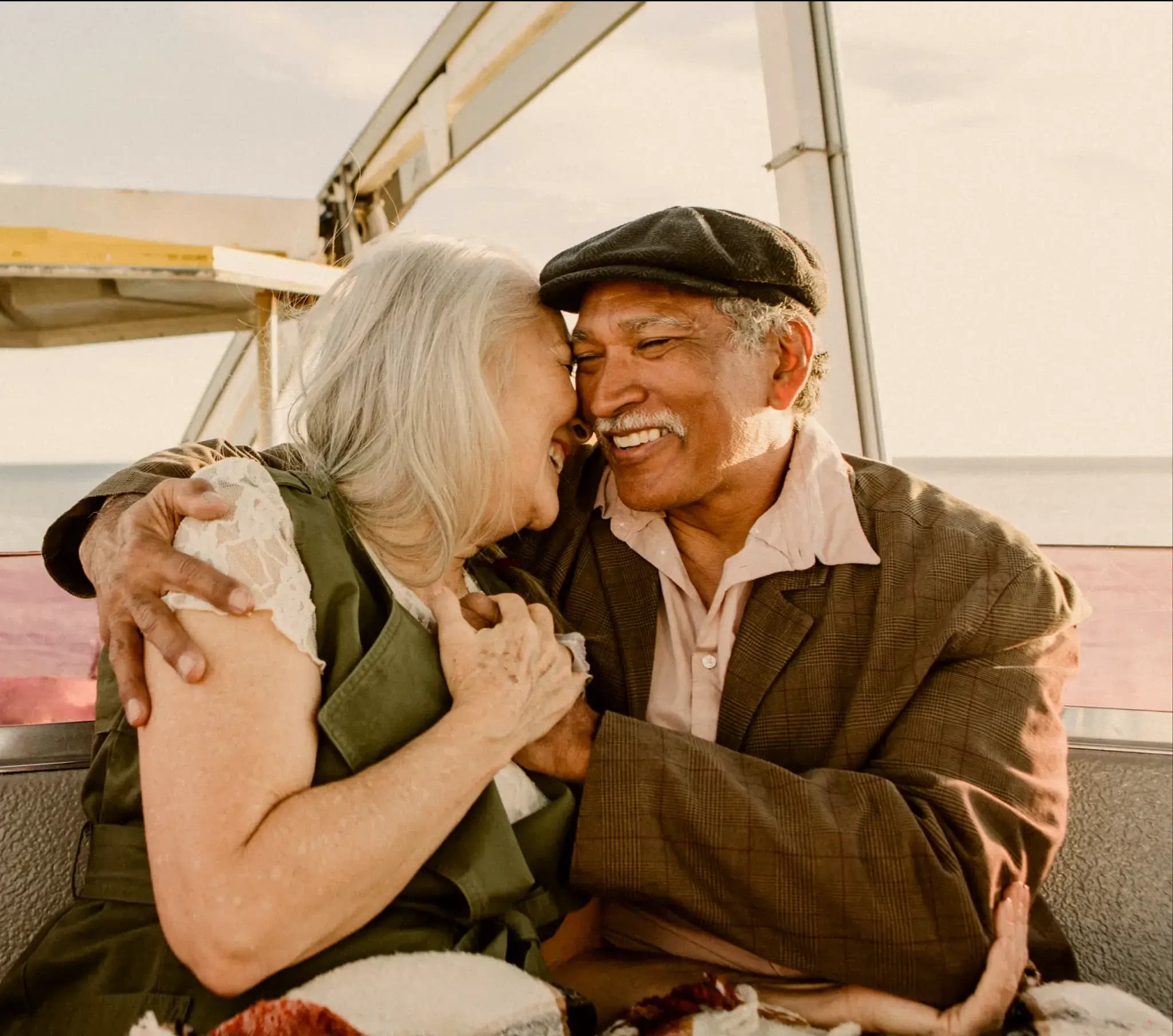 Man and women holding hands and smiling